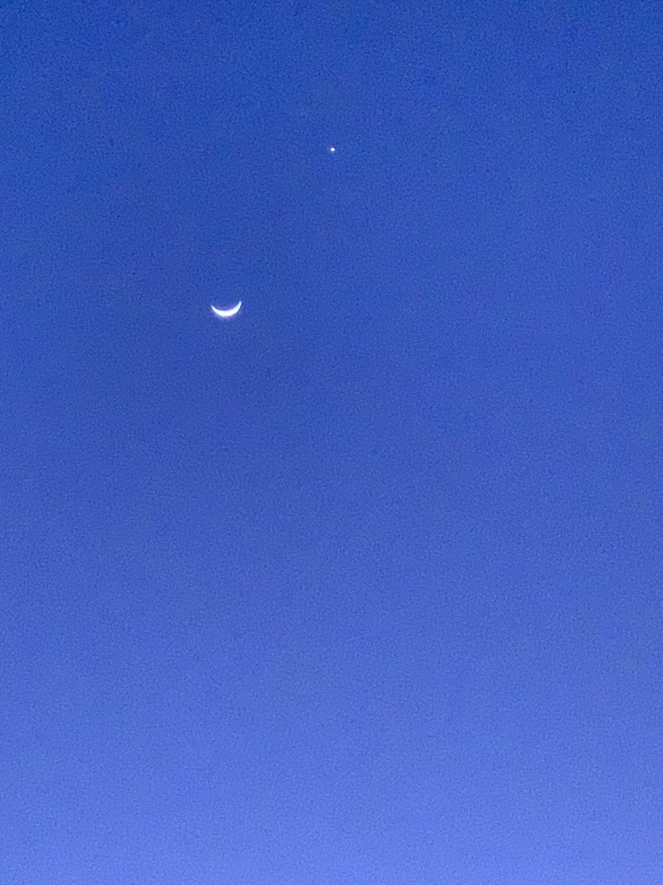 Crescent moon over Dakhla at twilight