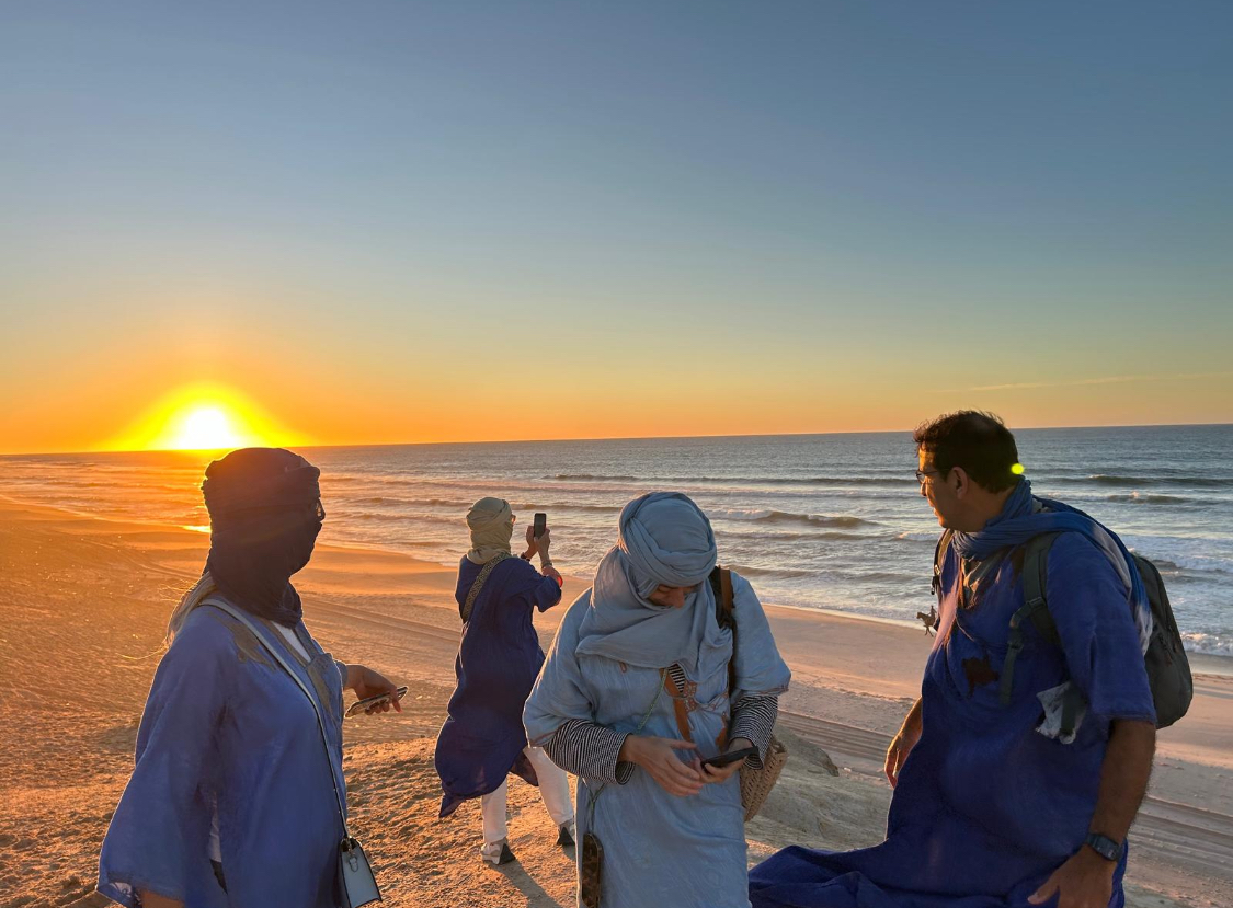 Sahrawi guides at sunset, Dakhla coast